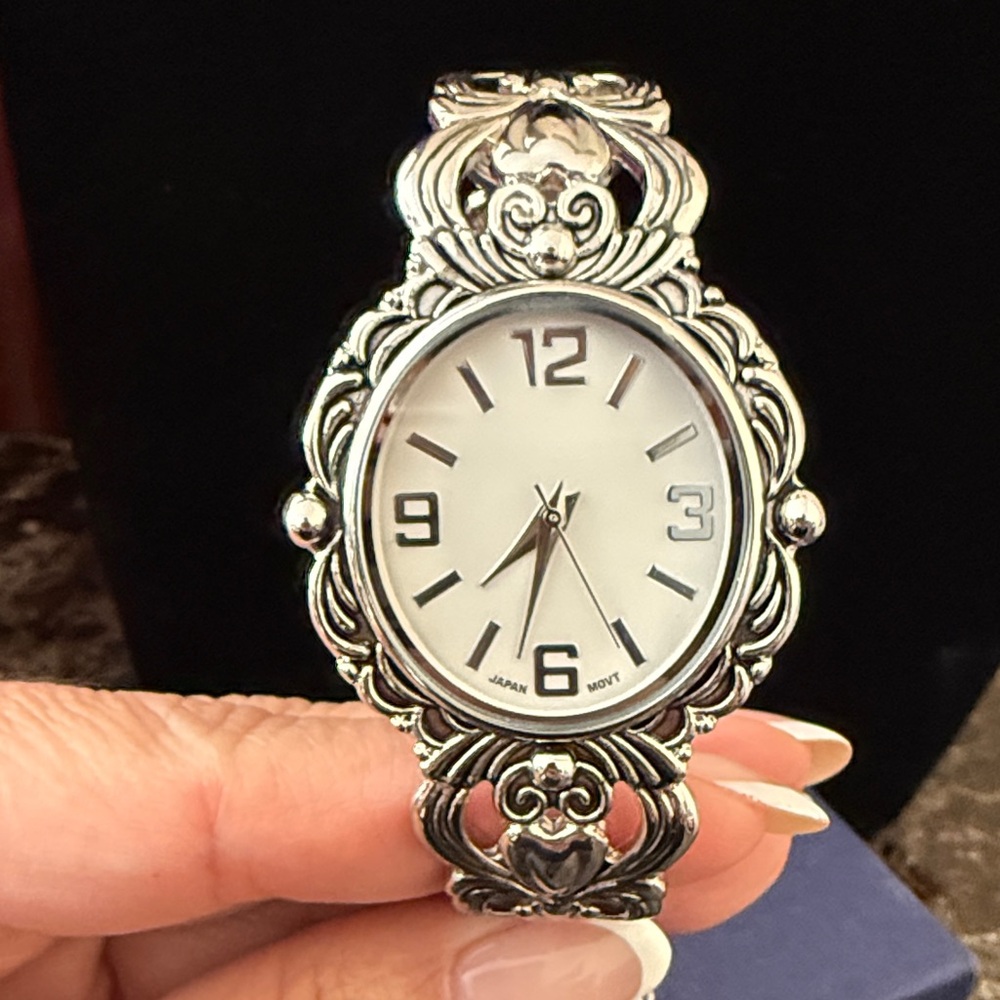 Japanese Quartz Women Cuff Silver Watch with Ornate Design